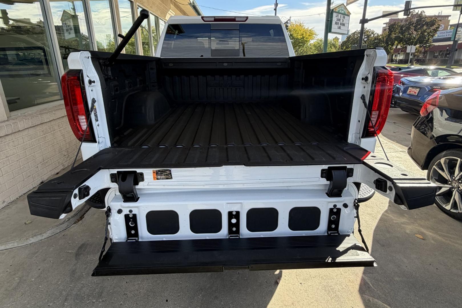 2025 Summit White /Black GMC Sierra 1500 AT4 (1GTUUEE85SZ) with an 6 Cyl 3.0 Liter Duramax Turbo Diesel engine, Automatic 10 Speed transmission, located at 2304 W. Main St., Boise, ID, 83702, (208) 342-7777, 43.622105, -116.218658 - New Tires! Remaining Factory Warranty! Nice Ride!- Photo#28