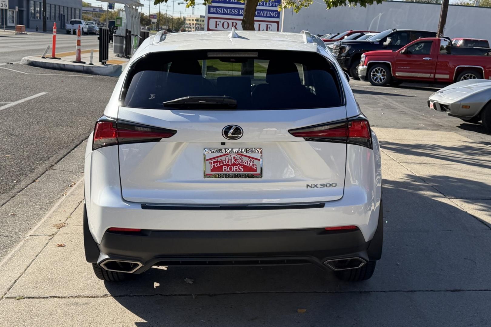 2021 Eminent White Pearl /Red Lexus NX 300 Luxury (JTJGARDZXM5) with an 4 Cyl 2.0 Liter Turbo engine, Automatic 6 Speed transmission, located at 2304 W. Main St., Boise, ID, 83702, (208) 342-7777, 43.622105, -116.218658 - Highly Optioned! Clean! All Wheel Drive With 18k Miles!- Photo#1