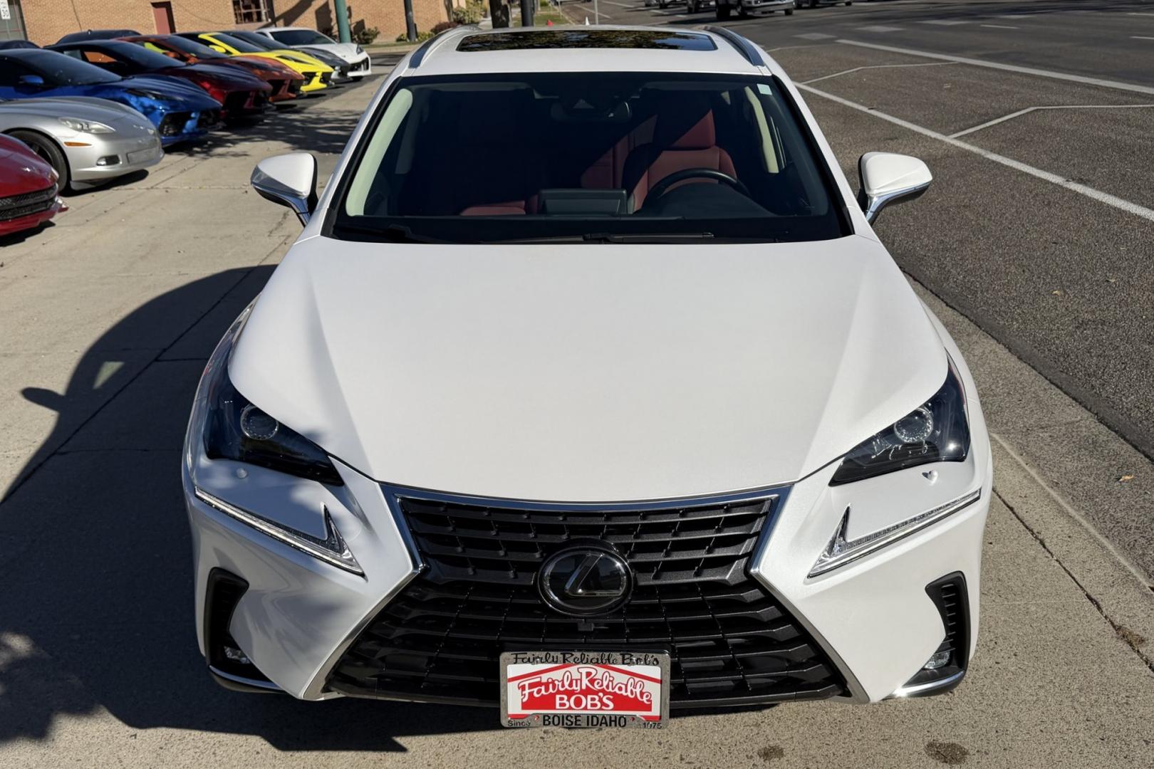2021 Eminent White Pearl /Red Lexus NX 300 Luxury (JTJGARDZXM5) with an 4 Cyl 2.0 Liter Turbo engine, Automatic 6 Speed transmission, located at 2304 W. Main St., Boise, ID, 83702, (208) 342-7777, 43.622105, -116.218658 - Highly Optioned! Clean! All Wheel Drive With 18k Miles!- Photo#3