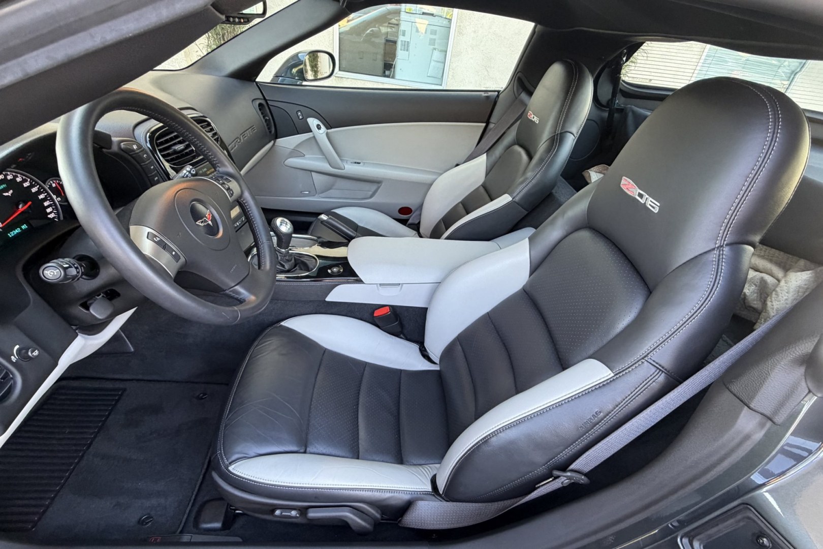 2009 Cyber Gray Metallic /Light Titanium Chevrolet Corvette Z/06 2LZ (1G1YZ26E395) with an 7.0L V8 OHV 16V engine, 6 Speed transmission, located at 2304 W. Main St., Boise, ID, 83702, (208) 342-7777, 43.622105, -116.218658 - Beautifully Cared For Z/06! Only 12k Miles!!- Photo#9