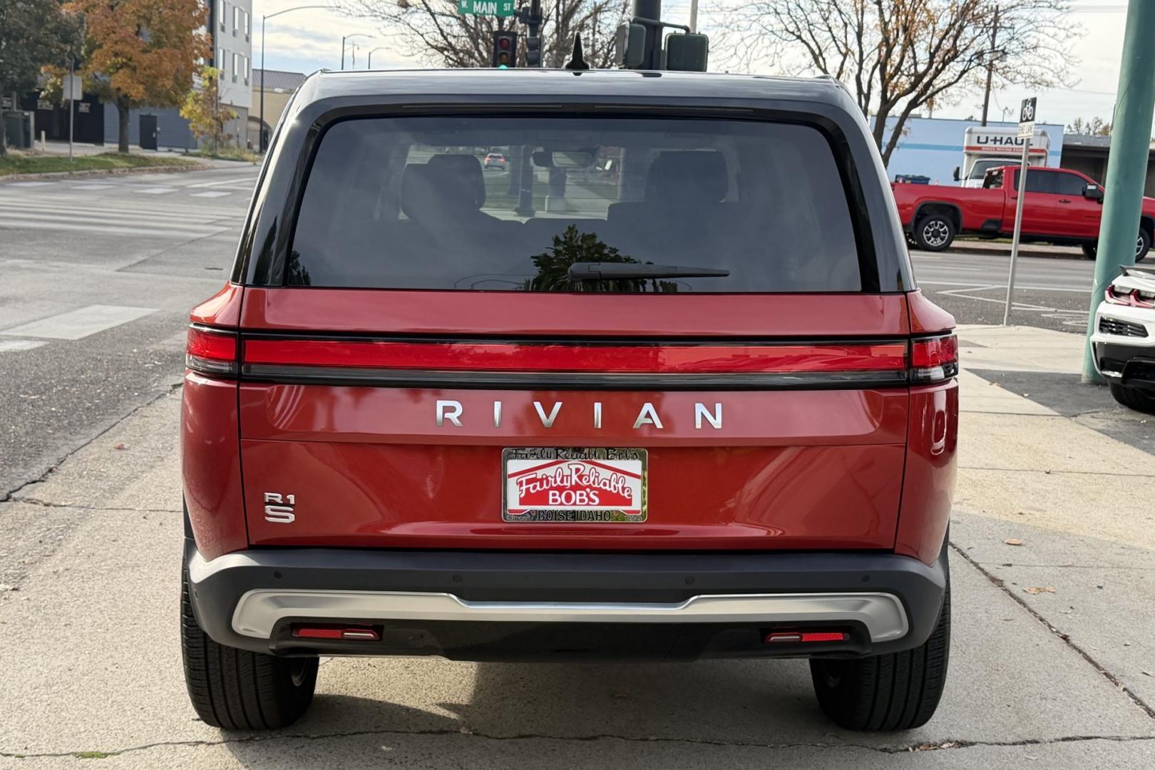 2024 Red Canyon /Shale Rivian Adventure Adventure (7PDSGBBA2RN) with an 135 kWh engine, Automatic transmission, located at 2304 W. Main St., Boise, ID, 83702, (208) 342-7777, 43.622105, -116.218658 - Stunning Rivian! Over 350 Miles of Range via EPA estimates. A lot of remaining factory warranty! Great Value!- Photo#1