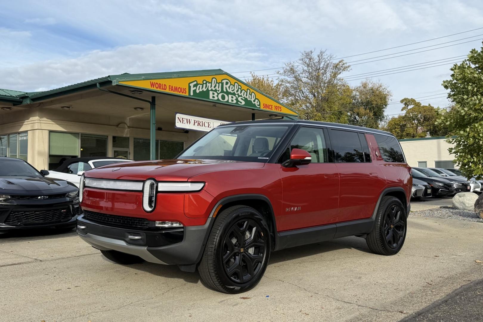 2024 Red Canyon /Shale Rivian Adventure Adventure (7PDSGBBA2RN) with an 135 kWh engine, Automatic transmission, located at 2304 W. Main St., Boise, ID, 83702, (208) 342-7777, 43.622105, -116.218658 - Stunning Rivian! Over 350 Miles of Range via EPA estimates. A lot of remaining factory warranty! Great Value!- Photo#0
